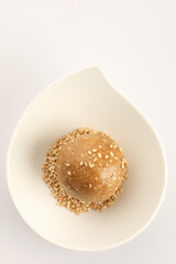 tilgud laddu, or seasame seeds and jaggery laddu made during the festival of sankranti