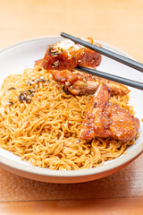 angle view teriyaki chicken with Lo Mein or noodles at vertical composition