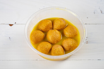 angle view golden curry flavor fish balls