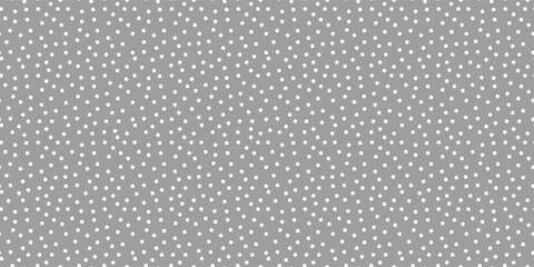 Small polka dot seamless pattern background. random dots texture. gray and white dots