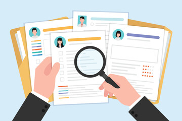Hand holding magnifying glass for searching data on resume document, CV document holding and looking concept.