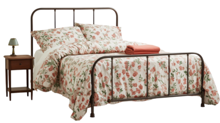 Cozy bedroom with floral bedding and a bedside table in a stylish setting