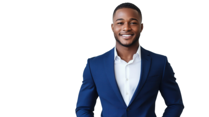 Confident young businessman in a tailored suit poses smiling against a plain background