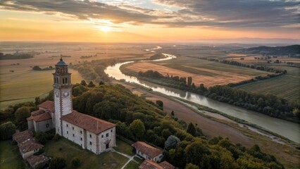 Scenic Church Overlooking River at Sunrise