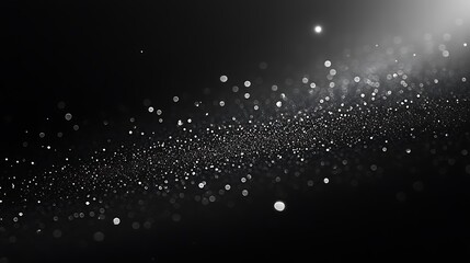 Abstract black and white background with shimmering particles and bokeh effect, resembling a starry night sky or cosmic scene