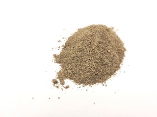 Spicy pile of pepper powder on a white background.