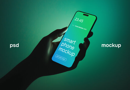 A hand holding a smartphone in a green and blue studio setting mockup