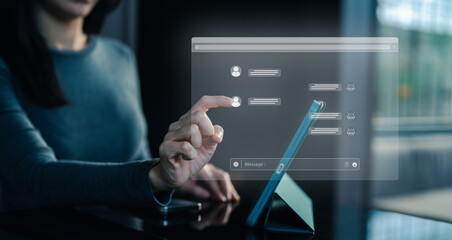 A person interacts with a digital interface on a tablet, showcasing modern technology and user engagement in a sleek environment.