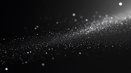 Abstract black and white background with shimmering particles and bokeh effect, resembling a starry night sky or cosmic scene