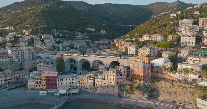 Bogliasco is one of the charming coastal towns of Genoa. It offers peaceful views of the Mediterranean Sea with its colourful houses, a beach on the coast and a train that runs over a historic viaduct
