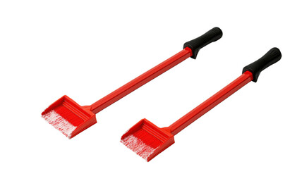 Fototapeta premium Red snow shovel pair designed for efficient snow removal in winter weather conditions