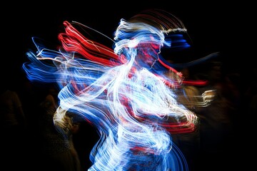 Colorful light trails capture a dancer in motion during an evening performance at a cultural festival