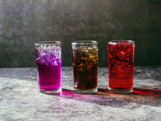 A lot of Soft drinks in colorful and flavorful glasses on the table,Glasses with sweet drinks with...