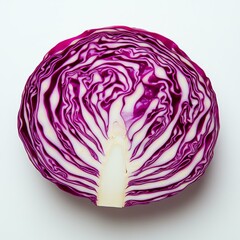 Fototapeta premium A vibrant, cross-section of purple cabbage displays beautiful, intricate patterns and textures, perfect for culinary and health-related themes.