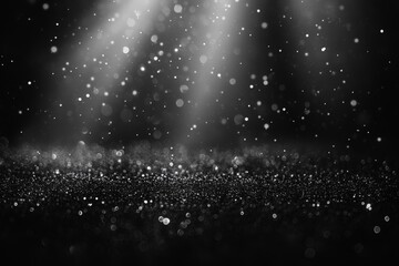 Obraz premium Sparkling particles illuminated by soft light create a magical atmosphere in a dark space