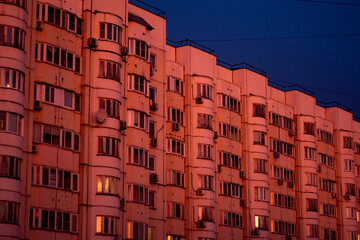 Urban Sunset with High-Rise Buildings and Warm Sky