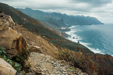 Rocky path and astonishingly beautiful view. Adventure in the national park in Canary Islands Tenerife