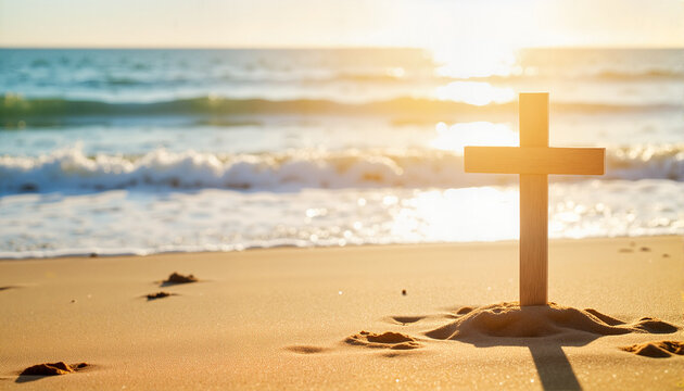 Wooden cross on sandy beach with sunset over the ocean for blogs, websites, spiritual themes, faith-related designs, greeting cards, and memorial announcements