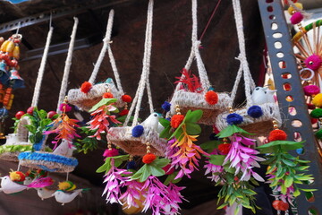 Artificial bird nest hangings, likely used for decorative purposes which are handmade and can be used as car or wall hangings