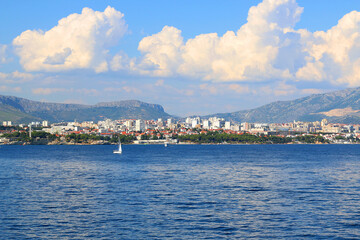 Obraz premium Contemporary buildings, gardens and beaches at the waterfront in Split, Croatia. View of Split from the boat.