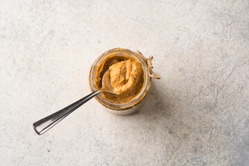  Delicious and healthy peanut butter on vintage  background