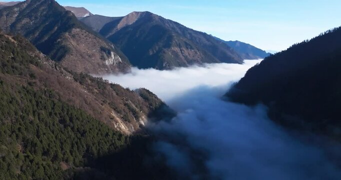 mist floating in the mountain valley at Sichuan China in the morning