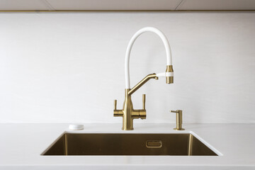 kitchen faucet on a stylish metal sink
