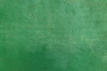 Rough green texture cement wall. Concept: Building, architecture, cement wall.