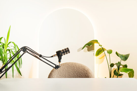 Engaging podcast setup with microphone and chair prepared for an insightful interview