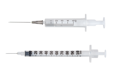 Syringes ready for medical procedures in a sterile environment during daylight hours