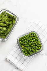 green peas in glass container for storage and cooking, healthy lifestyle, vegetable protein, potassium, fibervvv