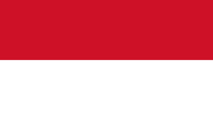 Red and white flag displayed prominently at a public location during a national celebration in Indonesia