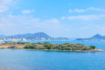 Fototapeta premium 春の弟子待の巌流島展望台から見た景色 山口県下関市 The view from the Ganryujima Observatory in Teshimachi in spring. Yamaguchi Pref, Shimonoseki City.