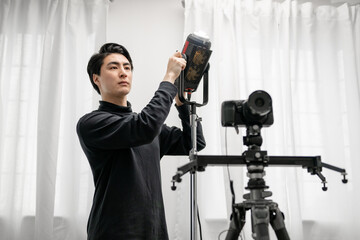 Fototapeta premium カメラマン スタジオ ライティング