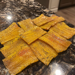Homemade savory mango snacks on kitchen counter.  Delicious, healthy, and easy recipe idea for social media