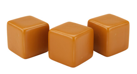 Fototapeta premium Three glossy, caramel-colored cubes stacked closely together.