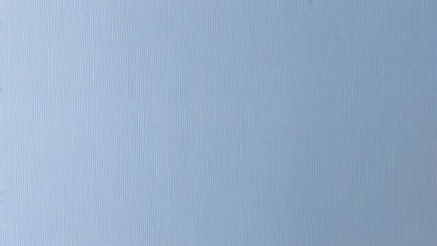 A clean light blue surface with subtle textures offering depth.