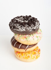 Doughnuts, Chocolate Brown and Pink Donut with Multicolored Sprinkles