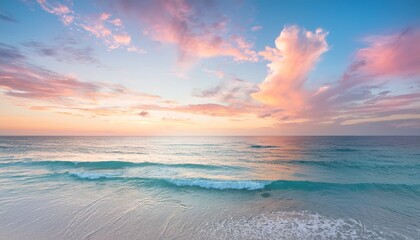Fototapeta premium Breathtaking pastel-colored sunset over the tranquil ocean, with soft gentle waves lapping the shore and fluffy clouds drifting across the colorful sky