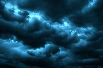 Black dark greenish blue dramatic night sky. Gloomy ominous storm rain clouds background. Cloudy thunderstorm hurricane wind lightning. Epic fantasy mystic.