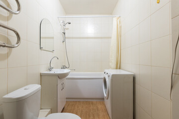 modern bathroom room with toilet and washing machine
