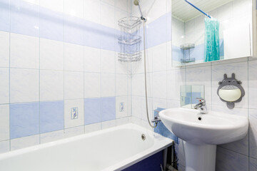 modern bathroom room with toilet and washing machine