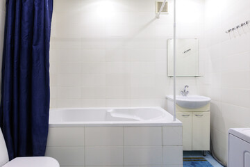 modern bathroom room with toilet and washing machine