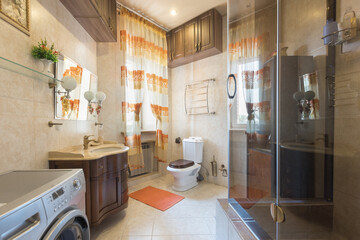modern bathroom room with toilet and washing machine