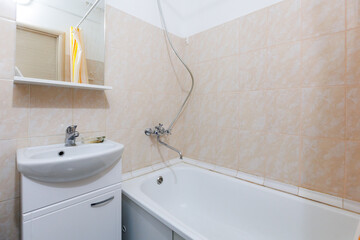 modern bathroom room with toilet and washing machine