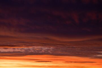 Sunrise sky with pink and orange clouds