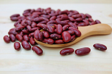 Red bean on wooden background.