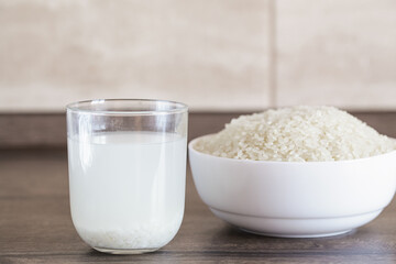 Rice and Rice Water, Organic waste, Bio Compost waste recycling concept. Organic cosmetics, rice water mask.