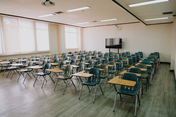class room with chairs and monitor big size