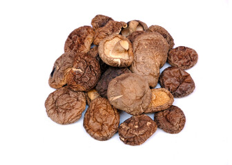 Dried shiitake mushrooms isolated on white background.